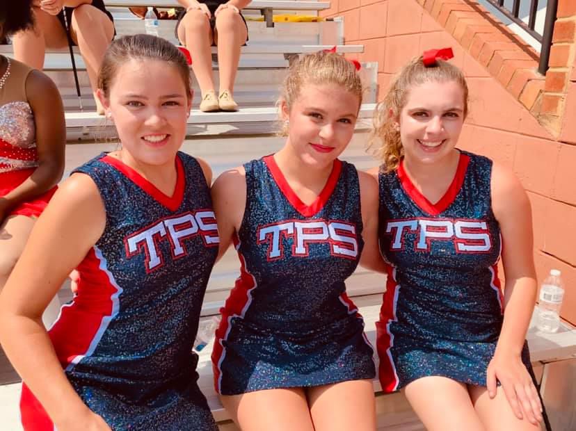 Trinity Cheerleaders perform with Huntingdon Honor Band